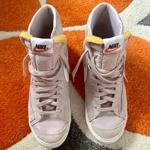 Nike blazer mid 77. Size 10 lilac high tops. Lightly used. Great condition.